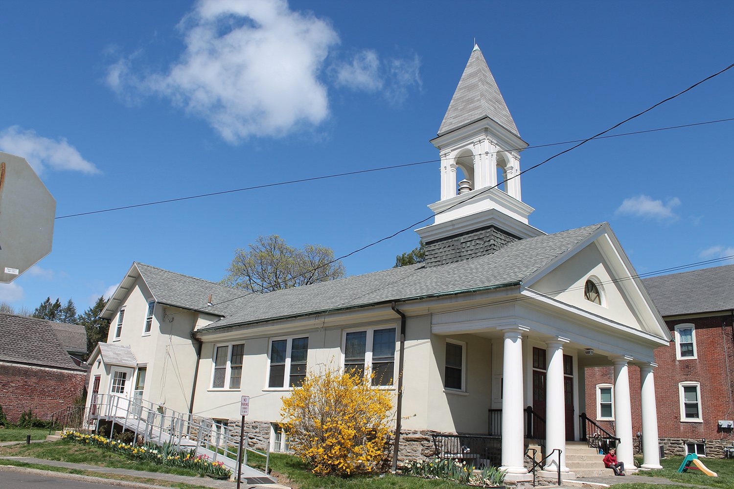 The Elkins Park Reformed Presbyterian Church building with its white steeple